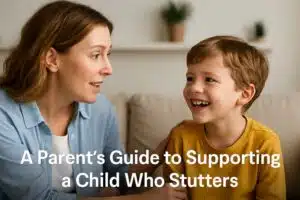 Smiling mother and young boy sharing a joyful moment on a couch, promoting a guide on how parents can support children who stutter.